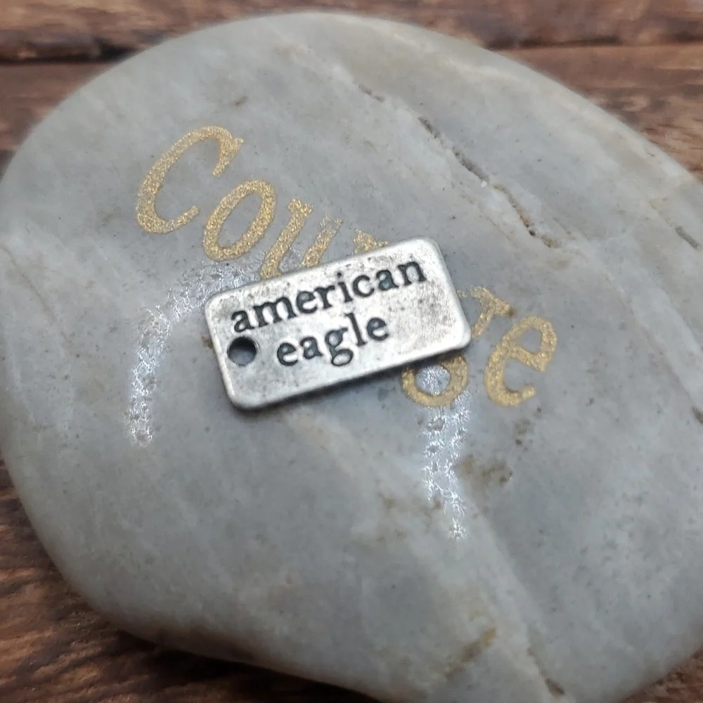 American eagle charm bar tag‎
